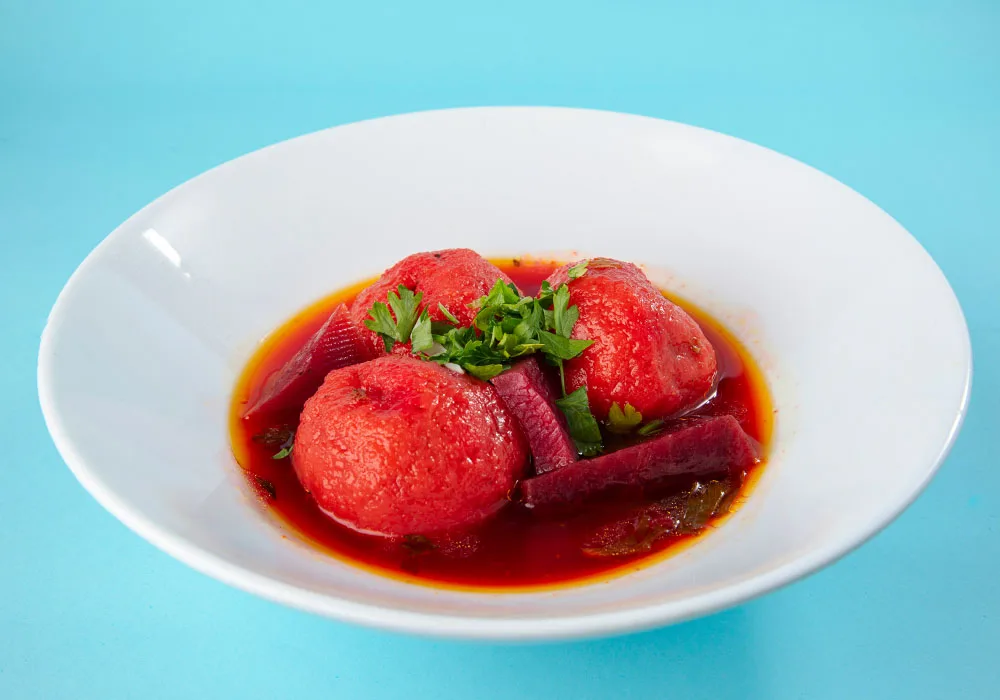 Kubeh dumplings in red beet soup